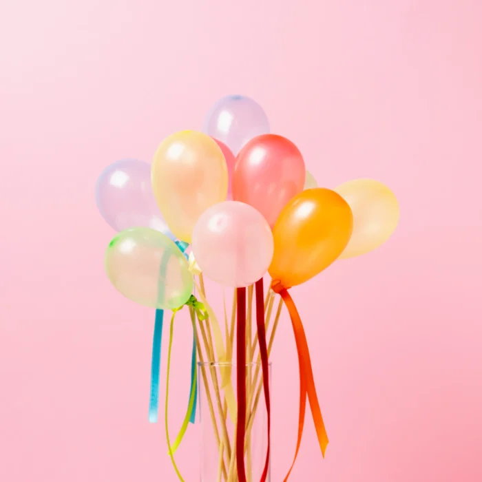 front-view-colorful-balloons-table