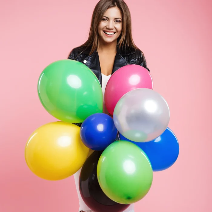 woman-leather-jacket-posing-with-bunch-colored-balloons